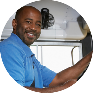 man behind wheel of school bus